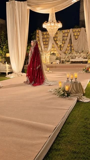 An ivory-draped celebration by The House Of Decorators